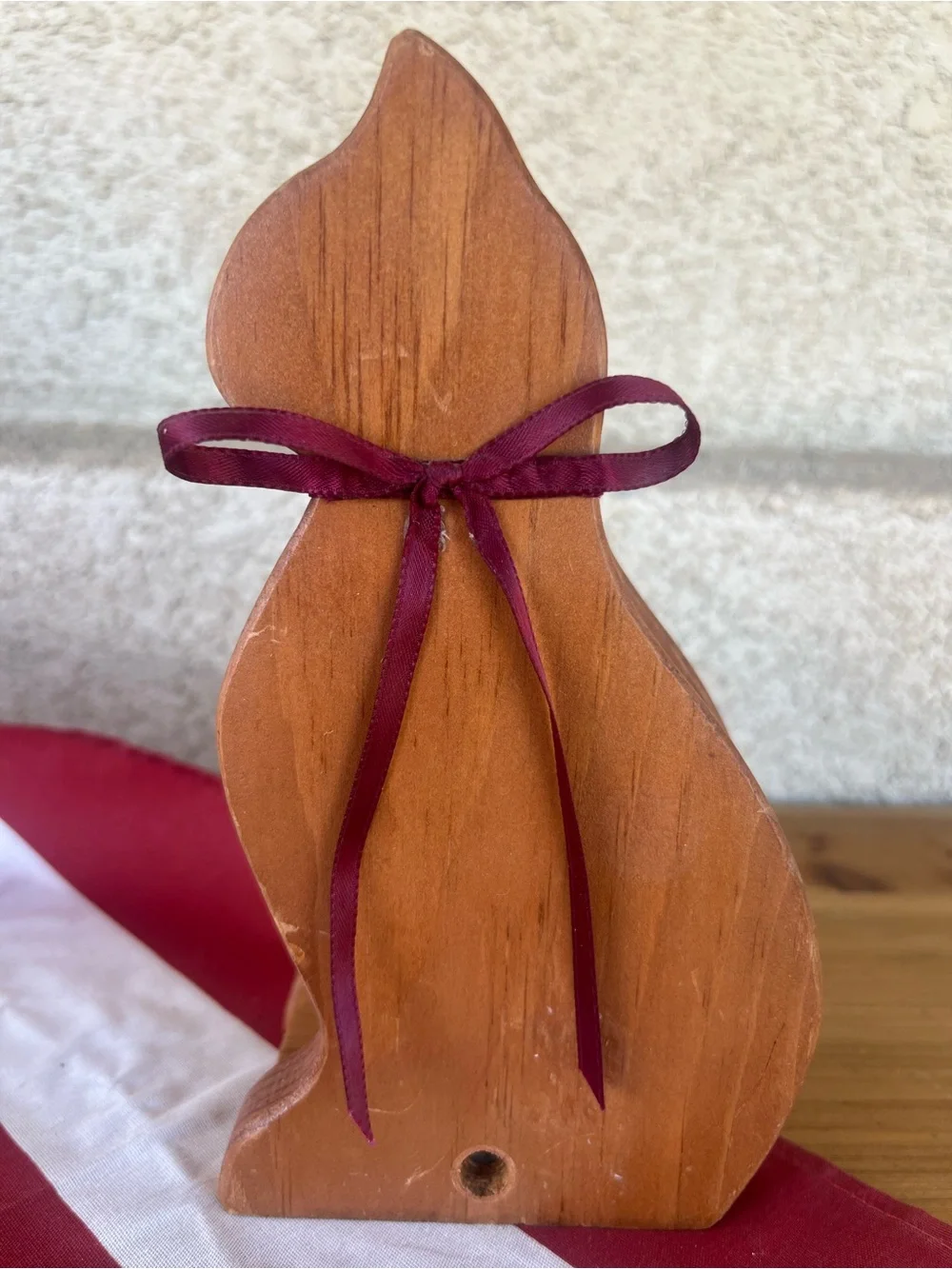 Wooden Cat Figurine with Burgundy Ribbon